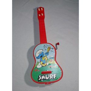 Smurfs Peyo 1982 RED Guitar Strummin’ Smurf Toy Musical Instrument Wind Up Sound